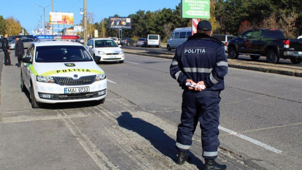 Polițist reținut pentru trafic de influență